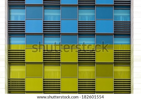 Ukraine blue and yellow color windows of modern office building horizontal background