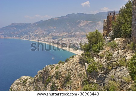 Aerial view on Alanya fortress and Cleopatra beach taken on bright sunny afternoon