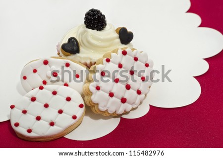 Delicious decorated cookies shaped like hearts