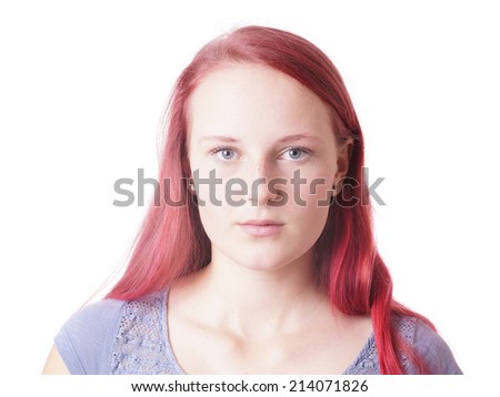 young woman with a neutral expression on her face