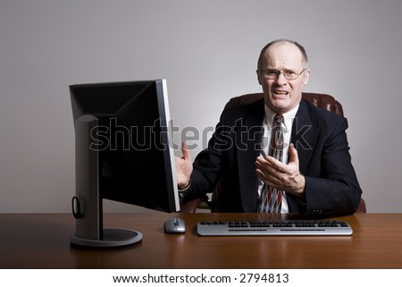 Series of an older businessman at desk.