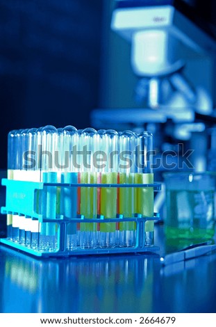 microscope and test tubes used in research