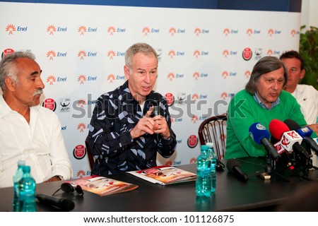 BUCHAREST, ROMANIA- APRIL 24: John McEnroe speaks to the media and gestures during BRD Nastase Tiriac Trophy press conference, on April 24, 2012, at Arenele BNR, in Bucharest, Romania