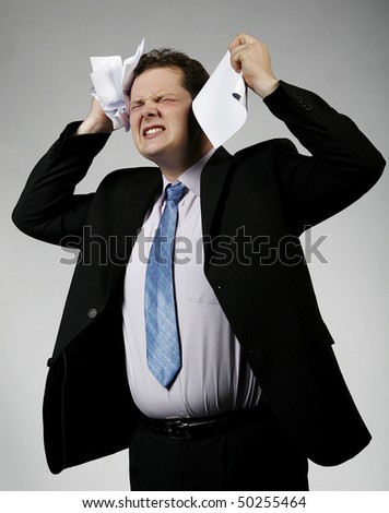 Businessman crying about un-success. Studio shot. Look for more in my portfolio