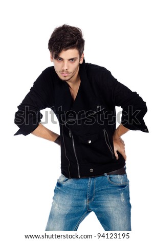 Confident young fashion model wearing jeans, boots and a black jacket. Isolated on white background. Studio vertical image.