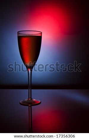 patterned wine glass with water droplets