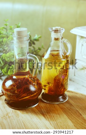 Retro toned photography with Olive oil and vinegar bottles.