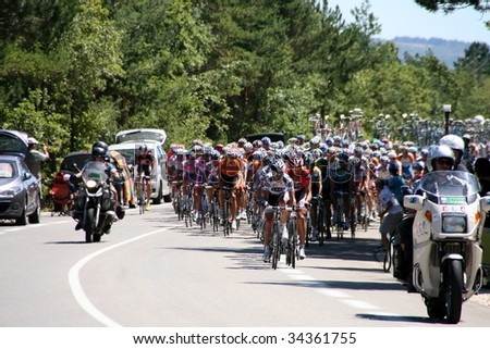 MT VENTOUX, PROVENCE, FRANCE – JULY 25: Participants of Tour de France 2009 compete at the last stage of the race by the ascent of the Mt Ventoux July 25, 2009 in Provence, south of France.
