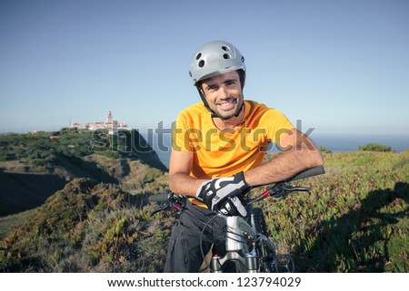 Happy mountain biker smiling