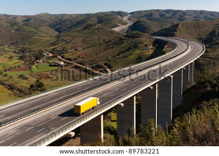 Yellow truck in bridge