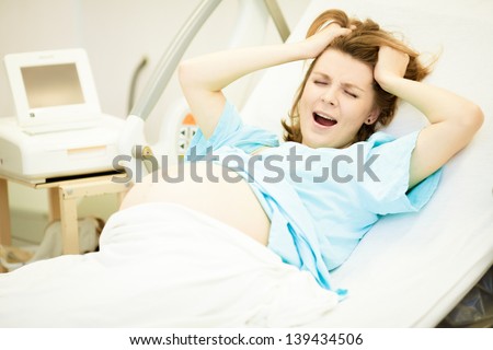 Pregnant woman in delivery room