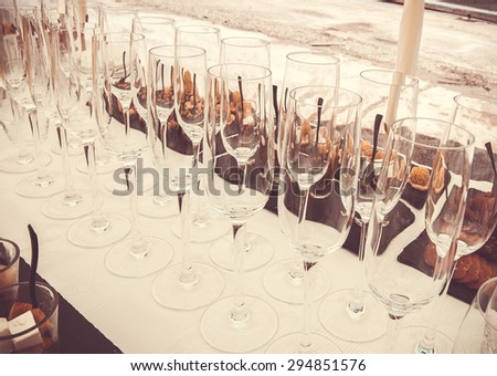 Buffet table close-up. Champagne glasses.