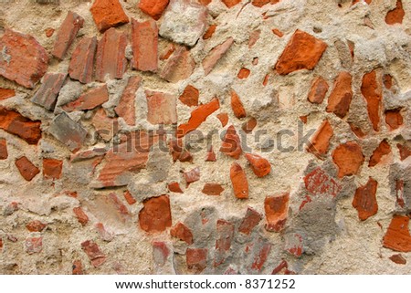 horizontal decaying wall made of concrete and brick