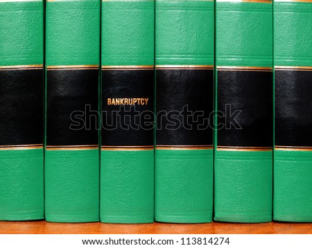 Close up of several volumes of books on bankruptcy