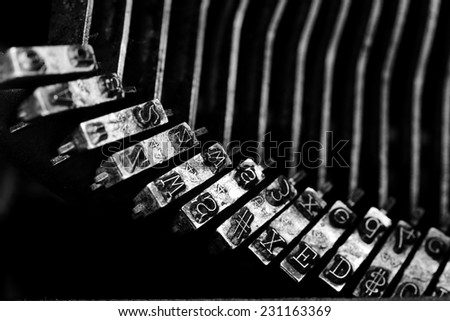 Closeup of old typewriter letters and keys for typing on documents business