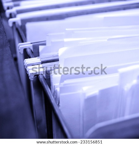Filing Drawer full of files and boxes