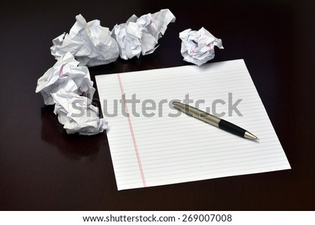 Ideas to be written down on blank sheet of paper crummpled sheets and pen