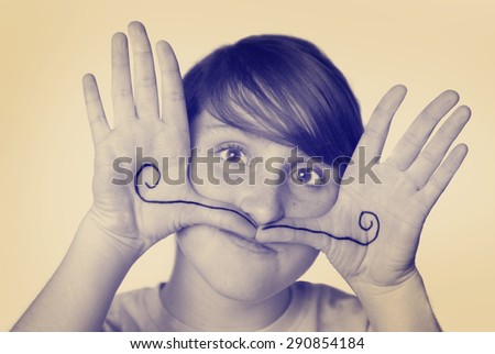 Instagram young girl with mustache drawn on hands silly face