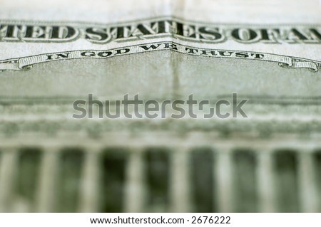 Closeup of cash bill with words In God We Trust