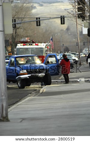 Car Wreck with Smashed Hood and FireTruck