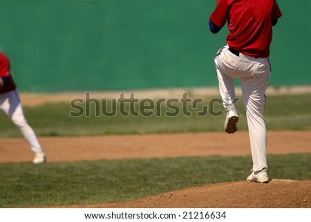Baseball player wearing uniform throwing baseball