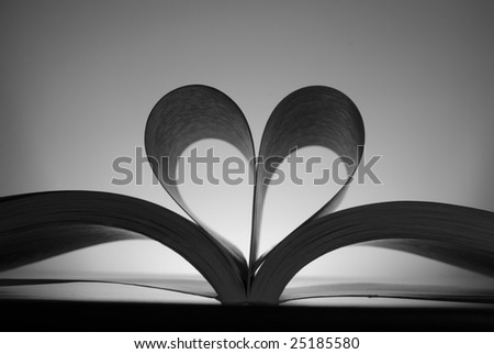 Book with pages turned into the shape of a heart