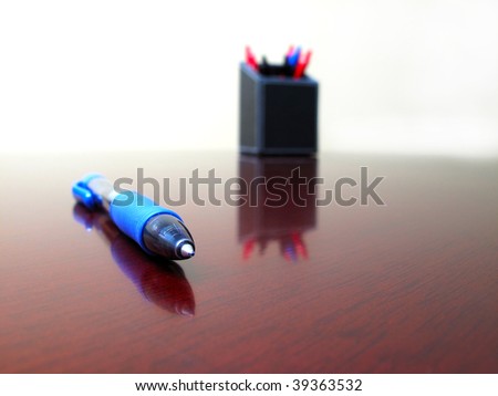 Ball point pen isolated on desktop
