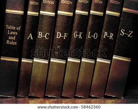 Row of old leather law books on a shelf