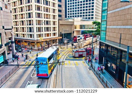 HONG KONG - JULY 30, 2012: Central District traffic and city life in this international financial center on July 30, 2012 in Hong Kong. The city is one of the most populated areas in the world