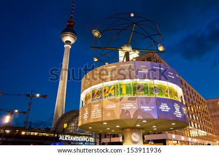 BERLIN, GERMANY - JUNE 07: Alexanderplatz, Tv tower and world clock night view on June 07, 2013 in Berlin. Called by Berliners simply Alex it is a large public square in Mitte district in Berlin.