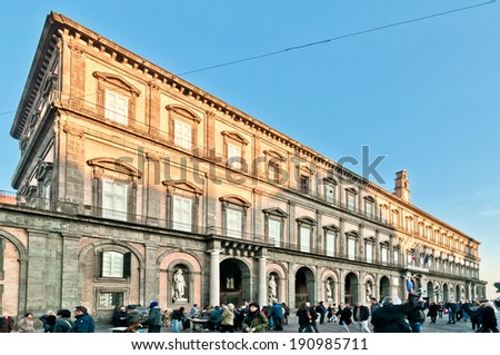 NAPLES, ITALY - JANUARY 1, 2014:  famous Royal Palace in Plebiscito Square in Naples, Italy. Naples\' historic city centre is the largest in Europe, and is listed by UNESCO as a World Heritage Site
