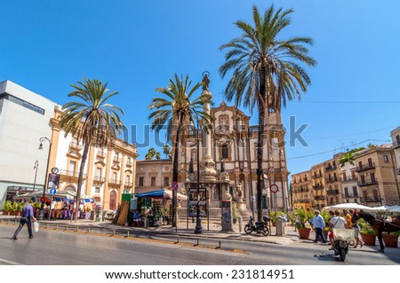PALERMO, ITALY - AUGUST 16, 2014: tourists in San Domenico square in Palermo, Italy. The baroque Church of San Domenico is in the square with the same name and was constructed between 1458 and 1480.