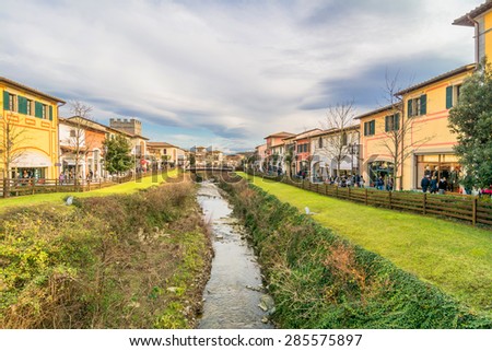 BARBERINO DI MUGELLO, ITALY - January 24, 2015: tourists shop at McArthurGlen Designer Outlet in Barberino di Mugello, Italy. Designer Outlet are located across Europe and offer discounts.
