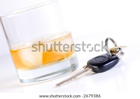 Car keys placed close to drink Don\'t drink and drive