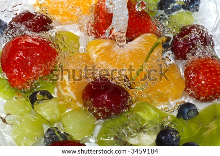 Washing fruits in fresh water, macro image