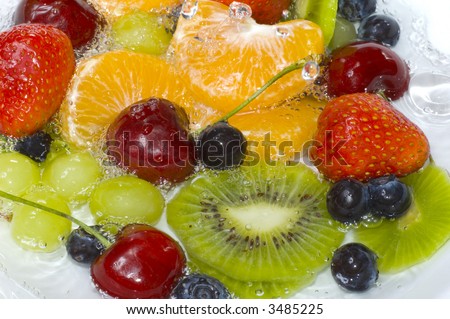 Washing fruits in fresh water, macro image