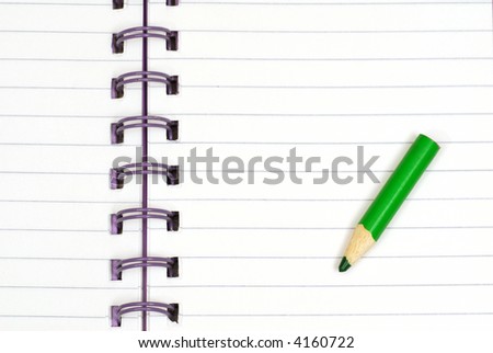 Notebook open and ready to take note with pencil on it