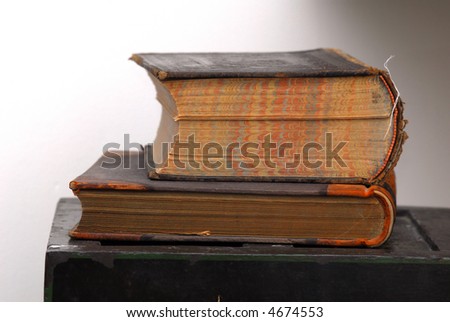 Antique books placed on an old chest