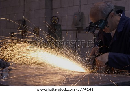 Factory worker doing his hard job