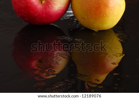 Fruit reflection on watery surface