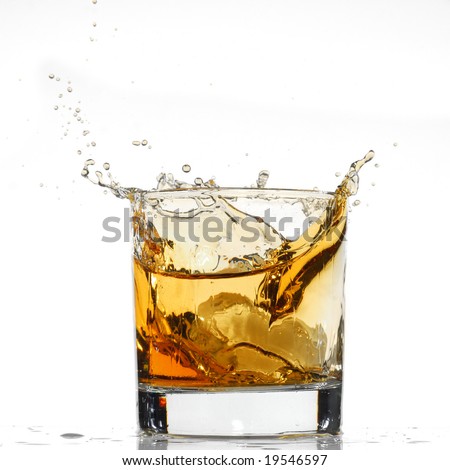 Whiskey splash studio isolated on white background