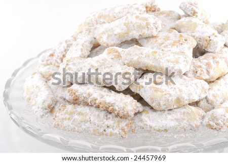 Dish full of cookies studio isolated on white background