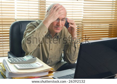 Stressed businessman after disappointing news received over the phone