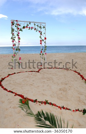 stock photo A decorated wedding arch with a heart made of flowers in the 
