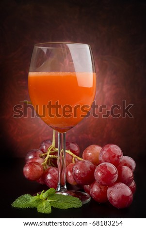 Image of grape juice, grape and mint with abstract background