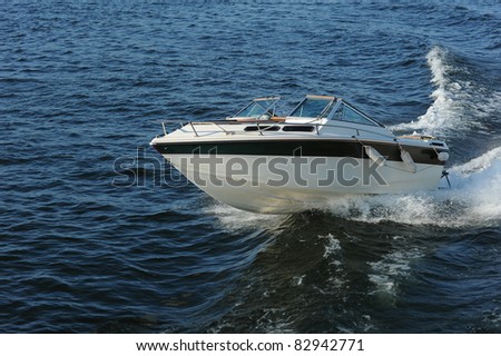 Fast motor boat with splash