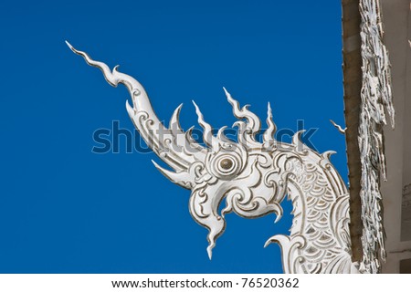 Naga or Snake Dragon head detail in Temple. White temple Chiang Rai Thailand, Cultural attractions, Chiang Rai, White wat, art, beautiful delicate task.