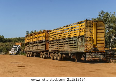 Road trains waiting for cattle to be loaded. at Broome in Western Australia