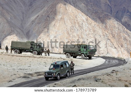 JAMMU & KASHMIR, INDIA - SEPTEMBER 04, 2011: Indian army convoy of trucks delivering supplies to remote military installations in Himalayas