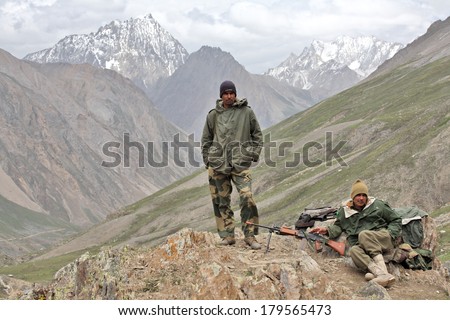 JAMMU AND KASHMIR, INDIA - JULY 17, 2006: Indian Army uniformed personnel in Kashmir Himalayas mountains.